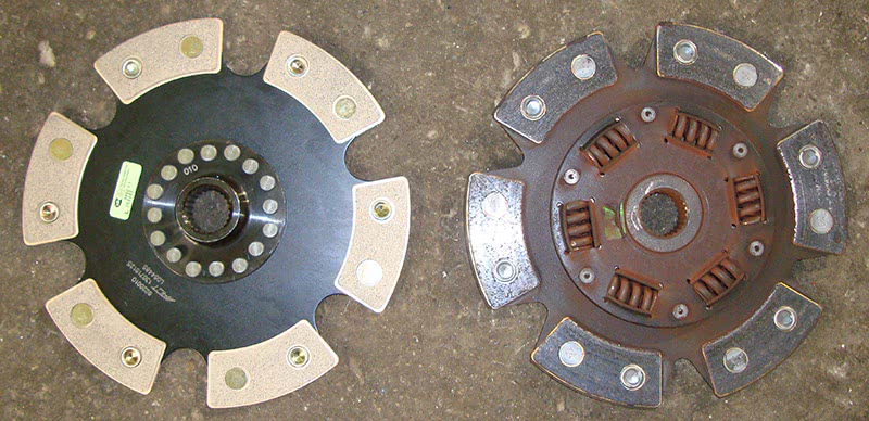 Although an upgraded six-puck clutch plate had been previously installed in the vehicle, we opted for the rigid design this time. The old clutch had springs to absorb some of the shock to the driveline when the clutch engages, which changes the weight of this part of the clutch assembly. This is more of a racing set up, and you will notice this during clutch engagement. six-puck clutch plate