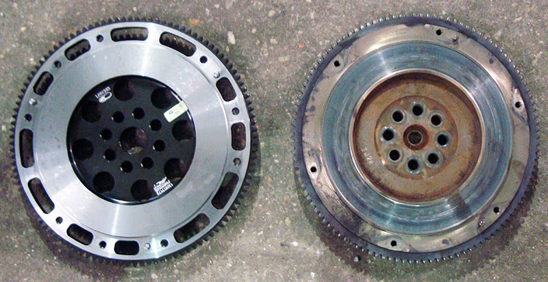 Will the huge reduction in rotating mass represented by the installation of that high-performance flywheel have negative driveability consequenses? After all, the one on the left weighs about 75% less than the stock unit on the right. Flywheel