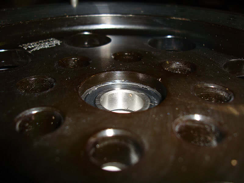 The clutch kit purchased comes with everything but the Prolite flywheel. Make sure to install or press the pilot bearing all the way in until it is fully seated up against the lip of the new flywheel. Pilot bearing alignment