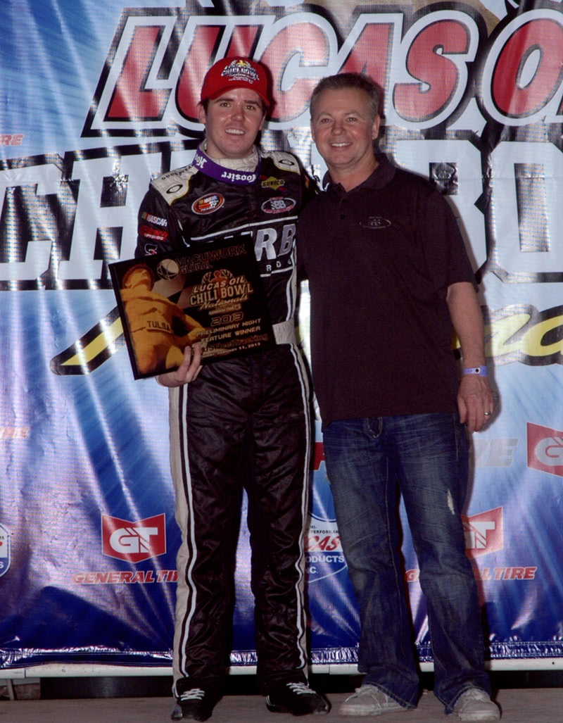 Billy Boat (right) congratulates his son, Chad (left), on winning the preliminary race for the Chili Bowl Nationals midget race. Like father, like son…