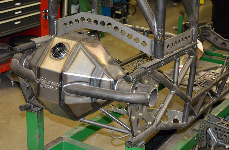 This gives you a good idea of what talent with a welder can get done. This Mini-mod pulling tractor frame is going together with a custom-fabricated rear axle housing. fabricated-differential-in-a-pulling-tractor