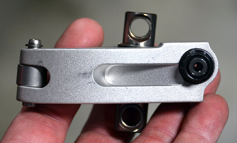 A whole valve train is often designed around heads with large and moved ports. On modern high-performance cylinder heads, it’s difficult to get the pushrod from the lifter to the rocker seat with the larger intake ports that are being developed. This Jesel rocker has a canted trunnion axle, an offset pushrod seat, and the tip that rides on the valve stem is bent at an angle to locate over the stem center. Plus, it’s just damned pretty work. angled-trunnion-tip-offset-pushrod-seat-all-to-get-from-lifter-to-valve-tip