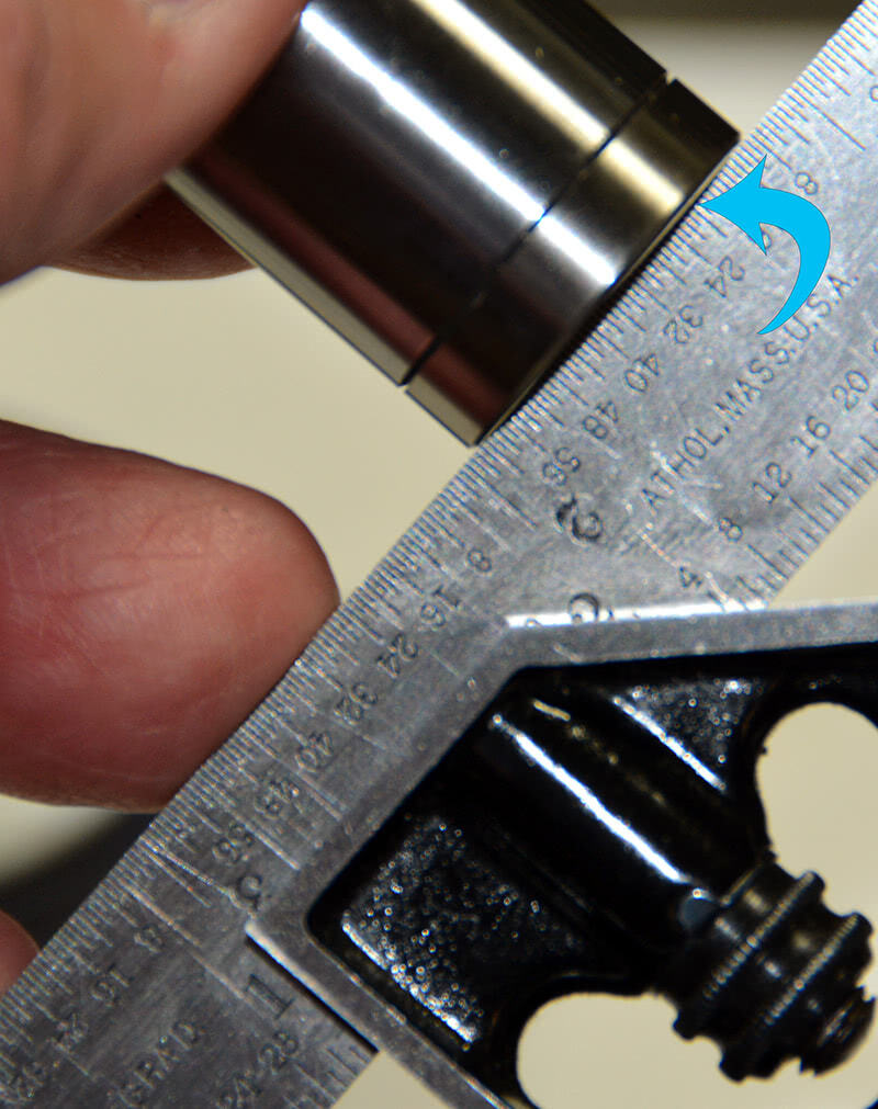I laid this solid lifter against a straight edge to see if I could see the convex form on the bottom, and it was clearly evident. I later measured it and it was just under .002 in. on this lifter. daylight-shows-through-at-the-arrow