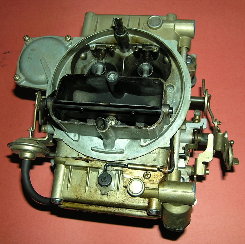 The back venturis of this carburetor show evidence that the engine is in need of tuning help.